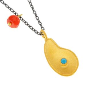 A COBBLE SHAPED PENDANT AND TINY STONE